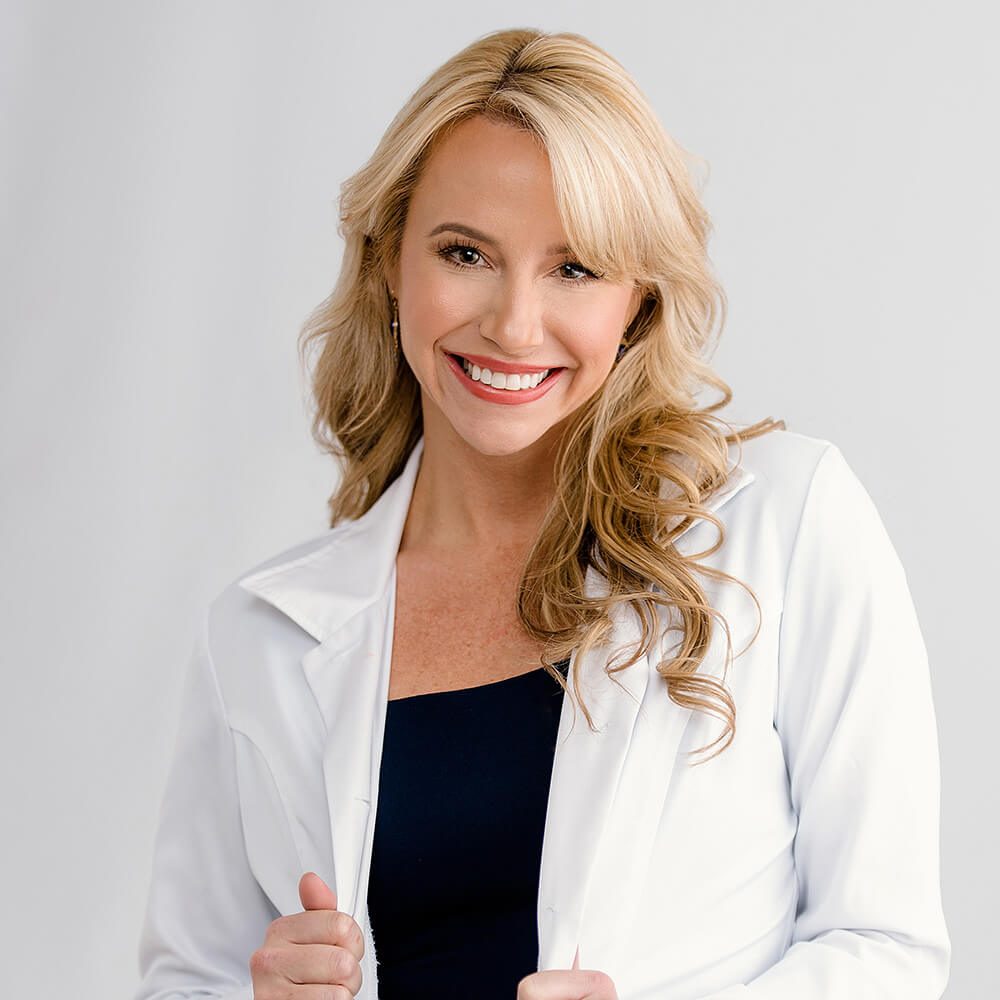 Dr. Lisa McCoy in her white jacket