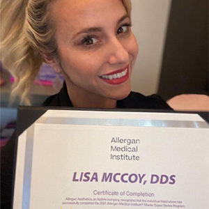 Dr. Lisa McCoy with her Allergan Medical Institute Certificate of Completion